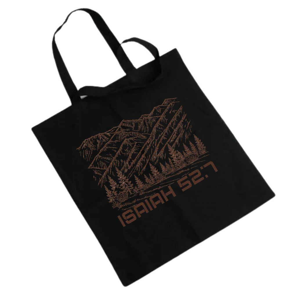 Black Tote featuring Montana Mountain Scene with Scripture Isaiah 52:7 under scene in brown font