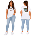 Model wearing a white soft-style cotton women's t-shirt featuring a large religious cross ornament design in brown, green, and red by Jesus Frees™ Apparel